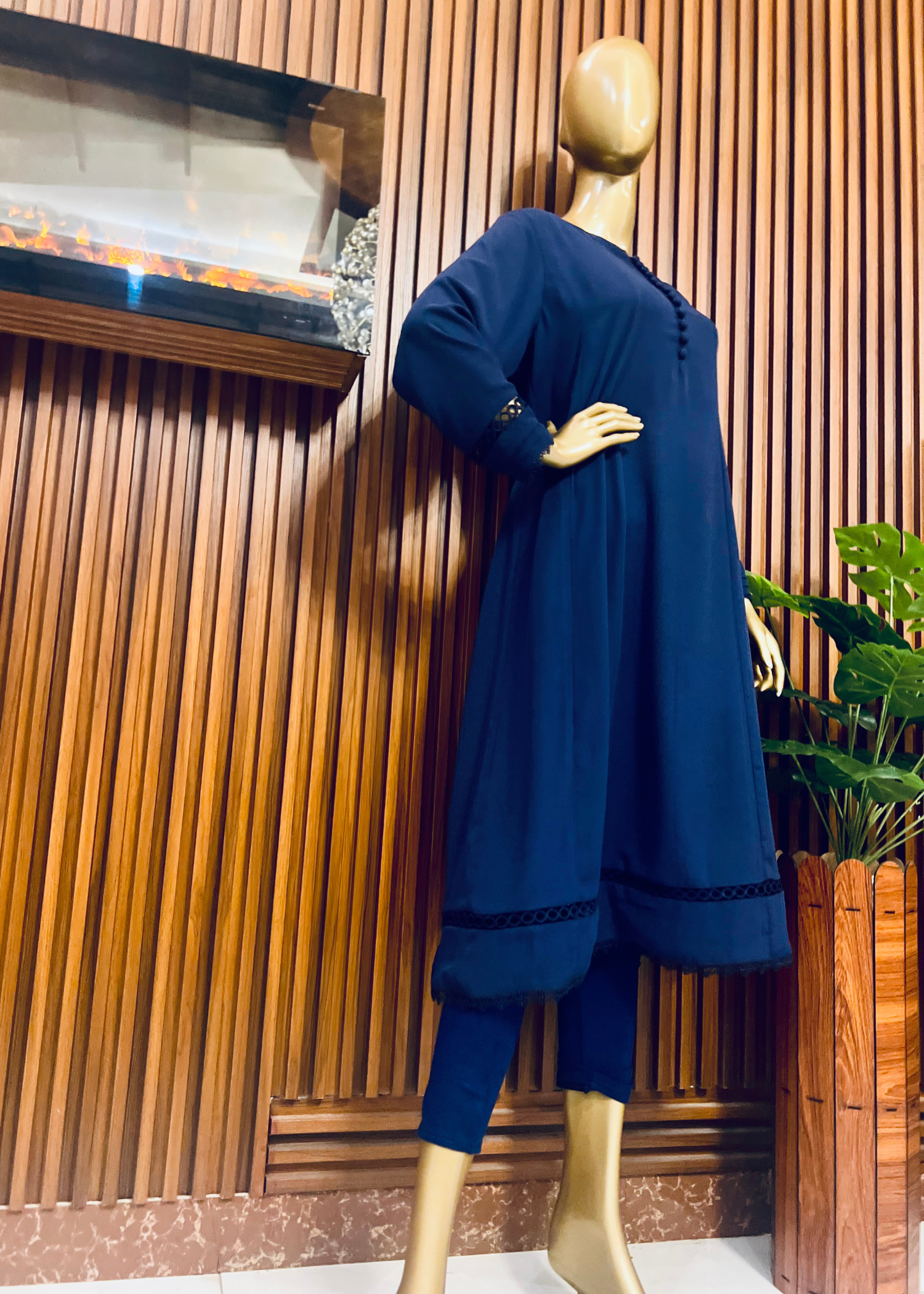 "Elegant blue A-line frock with flared silhouette and delicate detailing – perfect for festive and winter occasions by Rooh-e-Maan Studios"