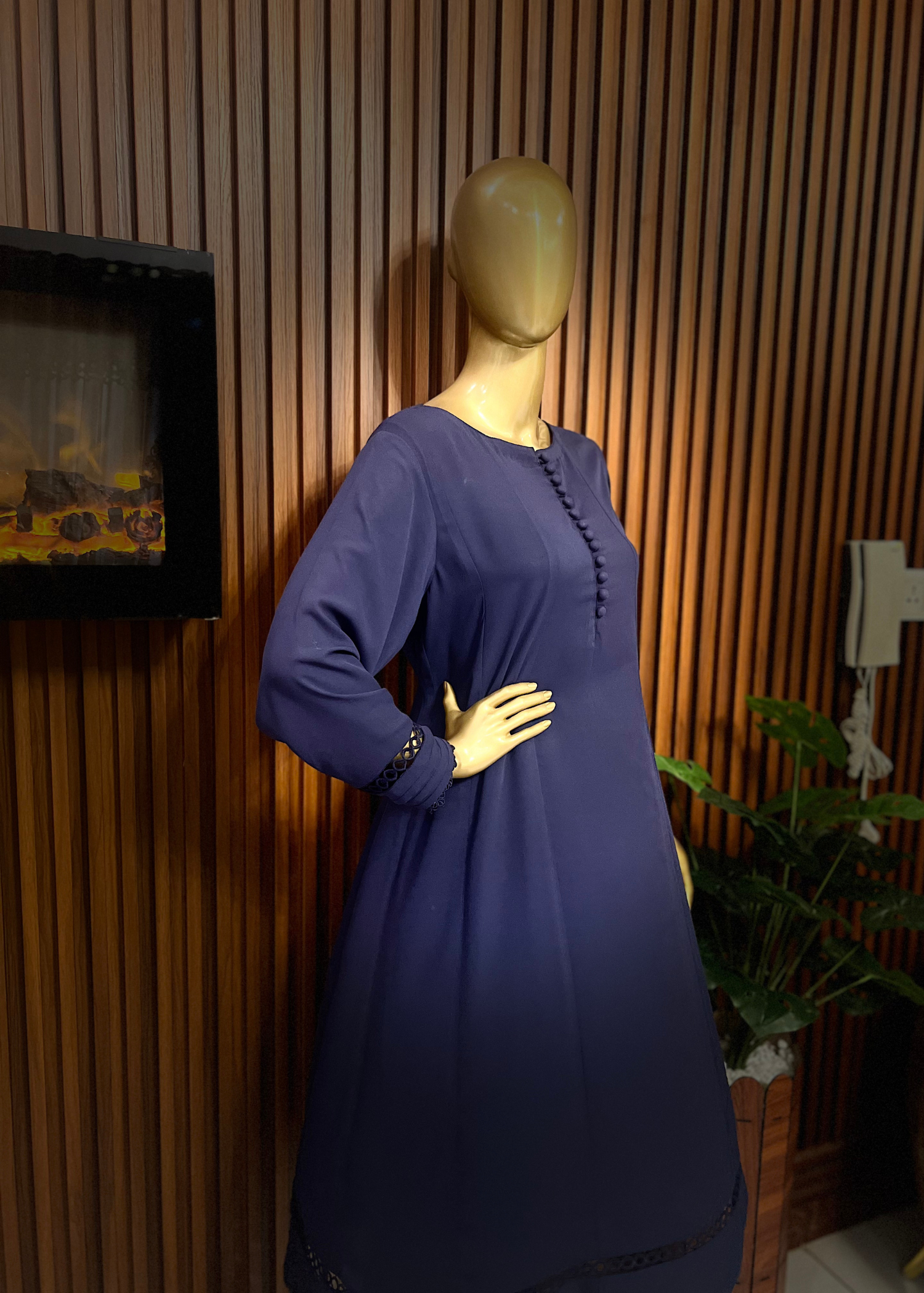 "Elegant blue A-line frock with flared silhouette and delicate detailing – perfect for festive and winter occasions by Rooh-e-Maan Studios"