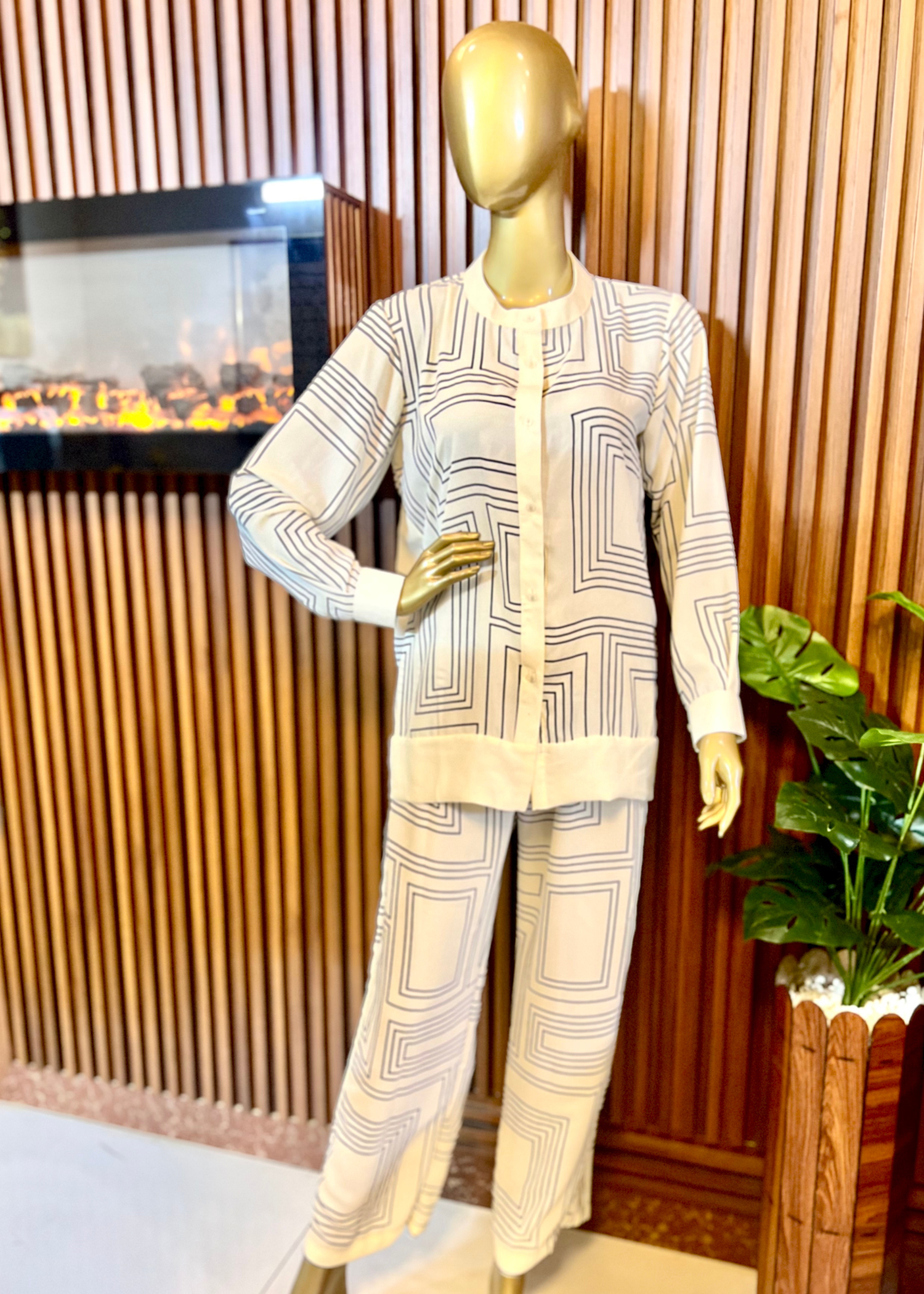 "Ivory co-ord set for women featuring bold geometric maze prints and relaxed fit – perfect for summer style and modern minimalist fashion by Rooh-e-Maan Studios"