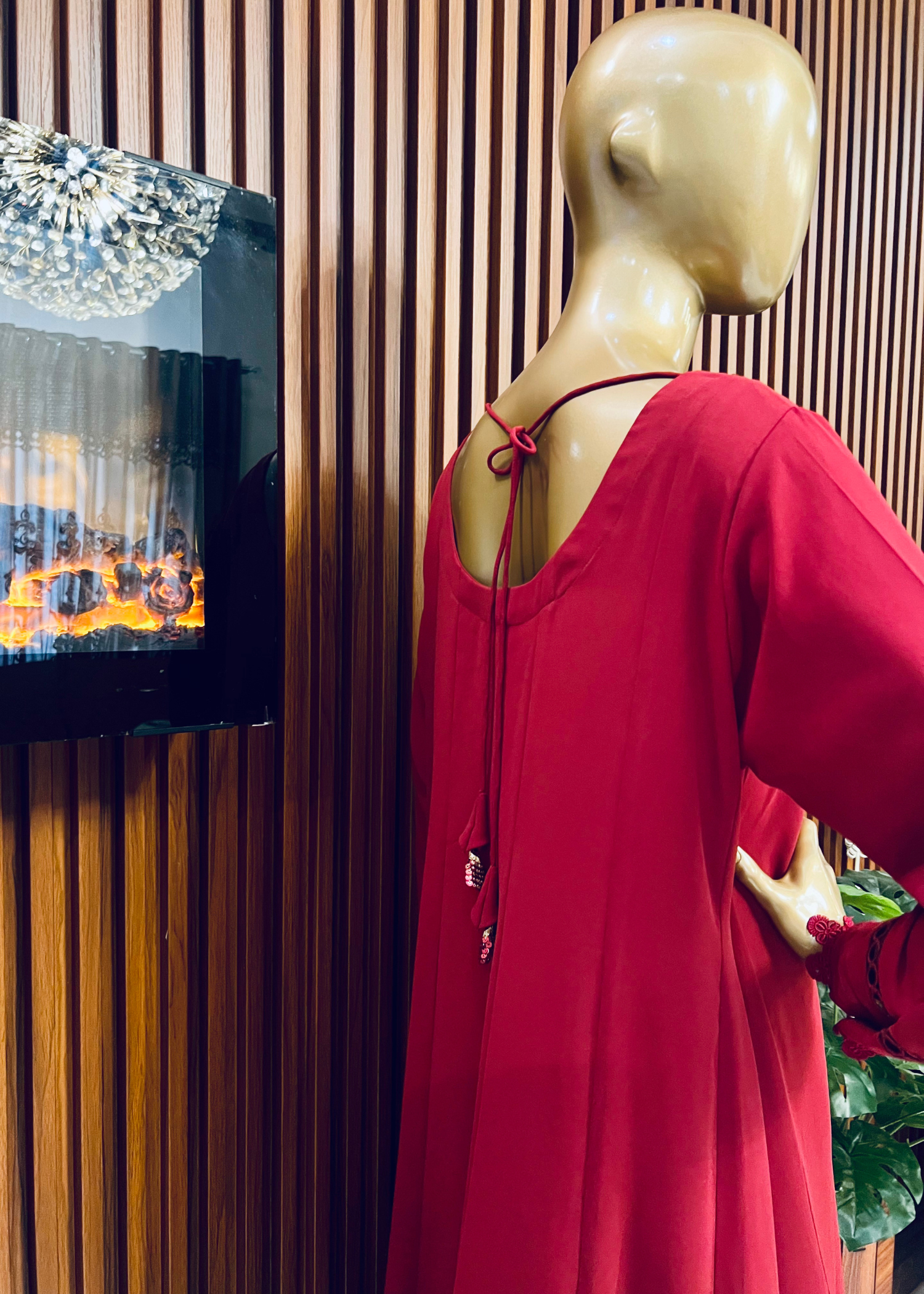 "Elegant maroon A-line frock with flared silhouette and delicate detailing – perfect for festive and winter occasions by Rooh-e-Maan Studios"