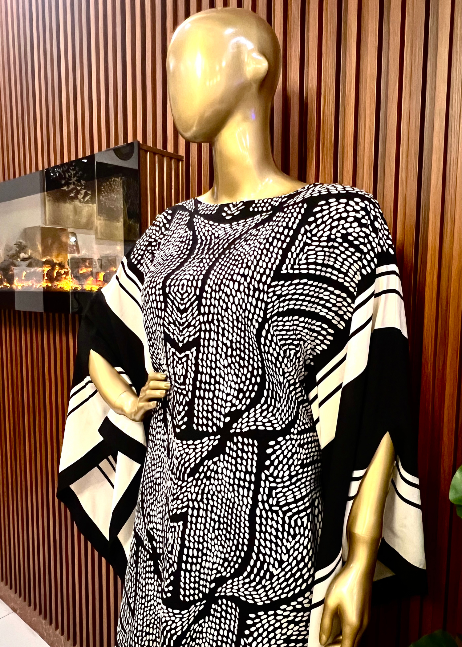 "Bold black and white printed kaftan dress for women with flowy silhouette and wide sleeves – perfect for summer elegance and modest fashion by Rooh-e-Maan Studios"