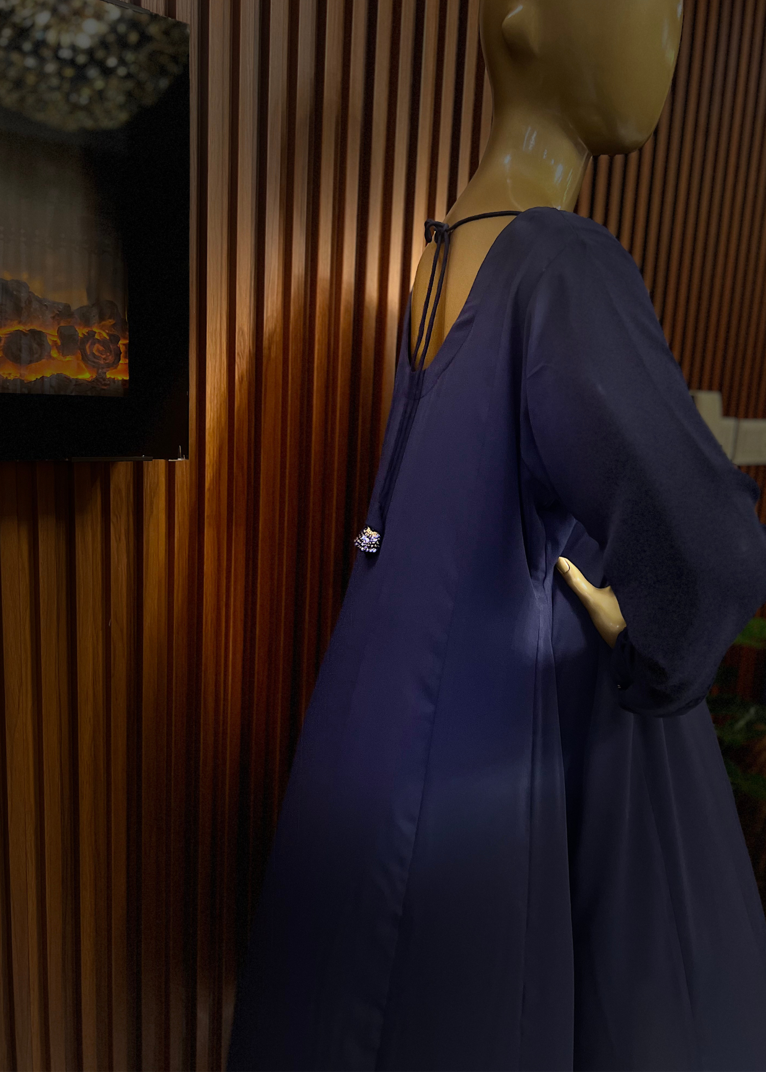 "Elegant blue A-line frock with flared silhouette and delicate detailing – perfect for festive and winter occasions by Rooh-e-Maan Studios"