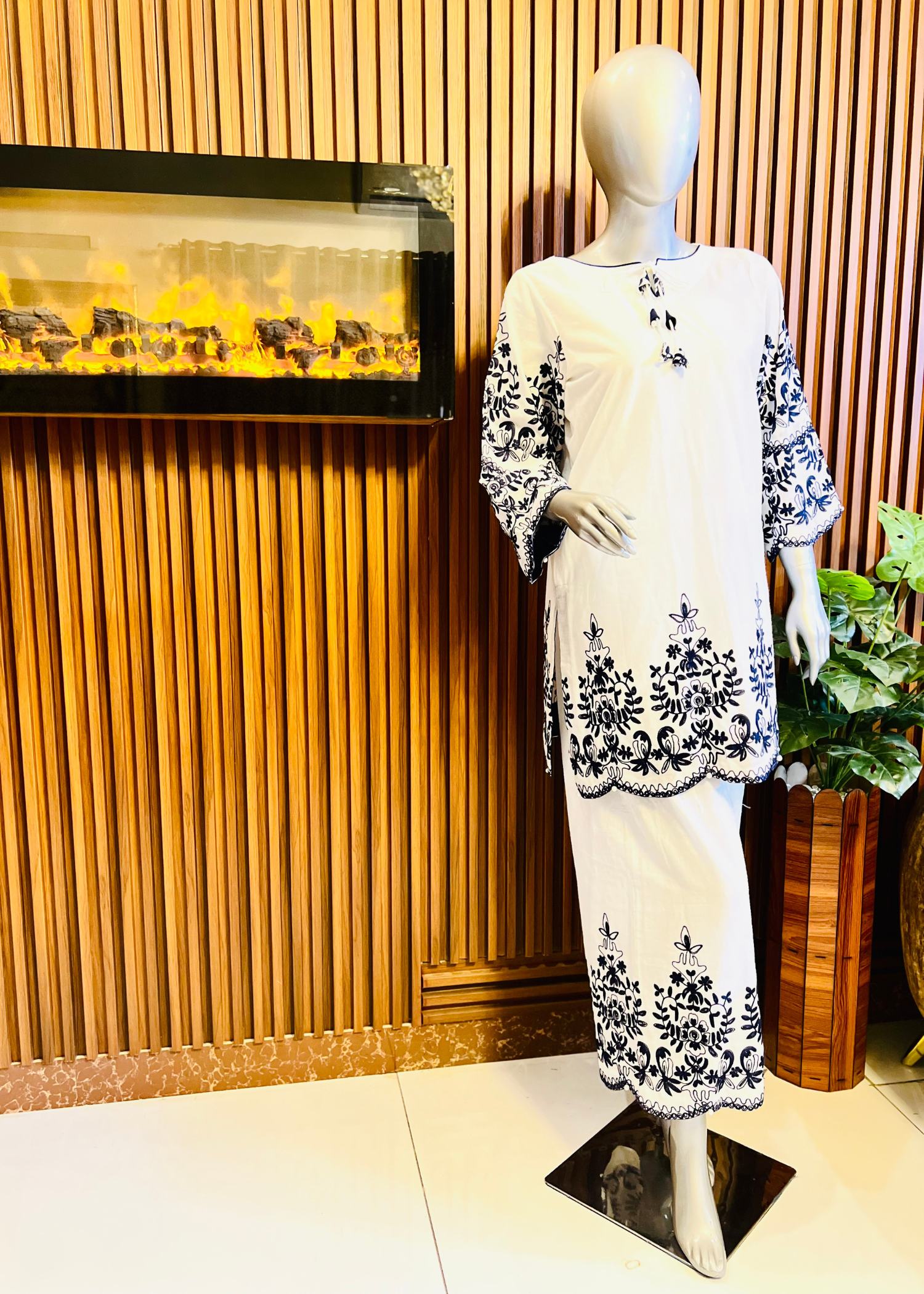 White blue embroidered women clothing formal & semi-formal. Kurti with flapper.