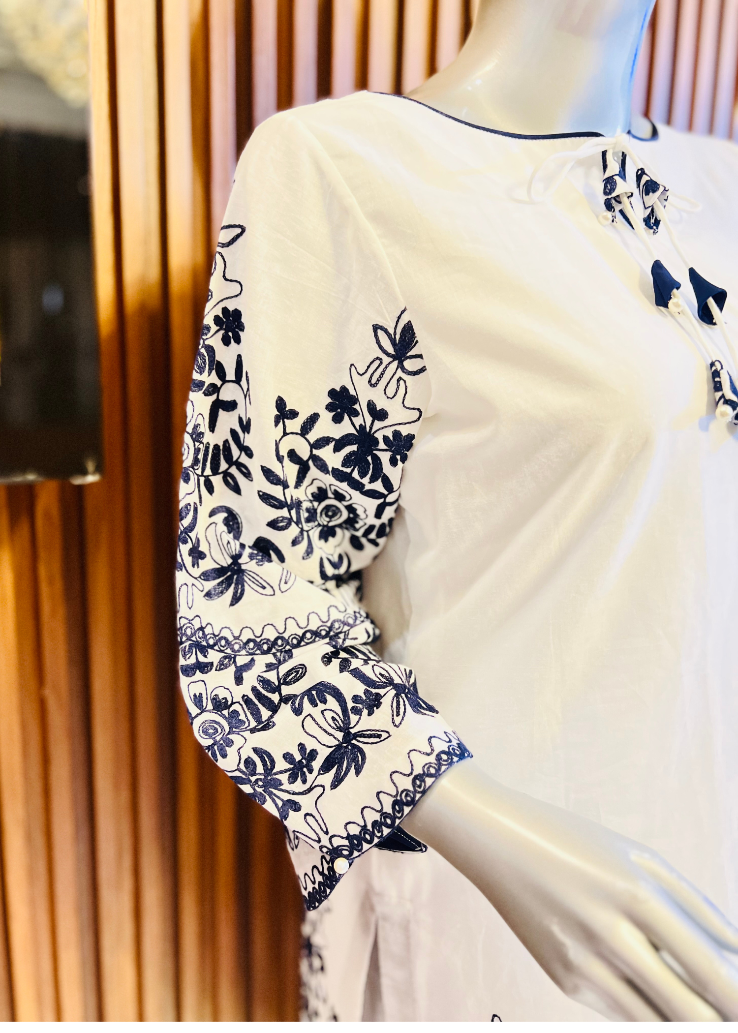 White blue embroidered women clothing formal & semi-formal. Kurti with flapper.