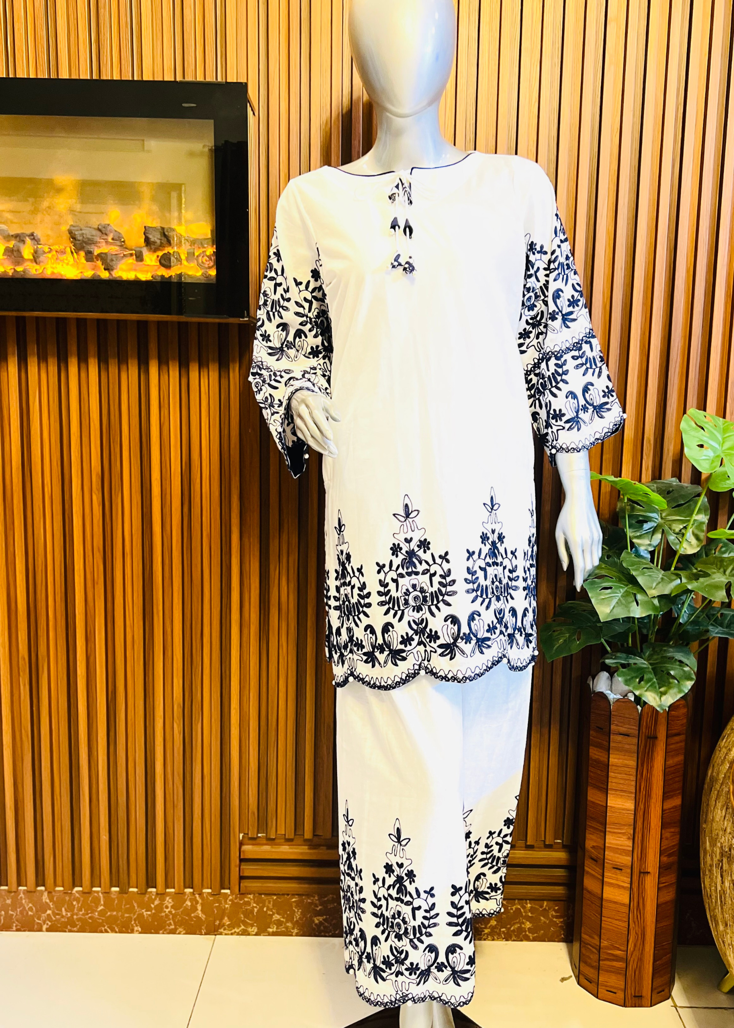White blue embroidered women clothing formal & semi-formal. Kurti with flapper.