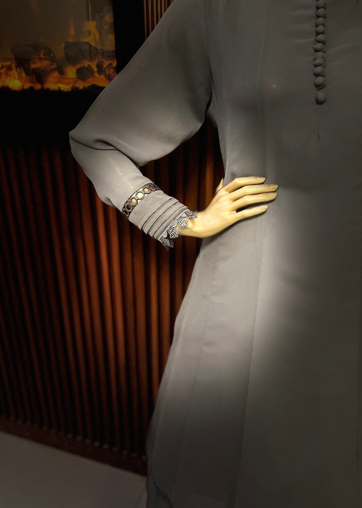 "Elegant grey A-line frock with flared silhouette and delicate detailing – perfect for festive and winter occasions by Rooh-e-Maan Studios"